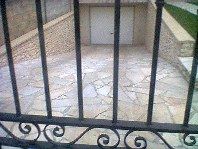 Pose revêtement sol garage Sartrouville